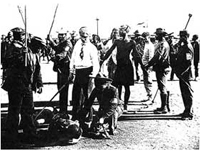 The passive resistance movement begins with a mass meeting of 2000 Africans