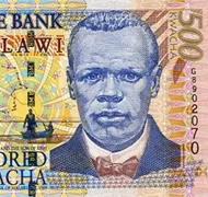Malawi switches over to a new decimal currency, the Kwacha