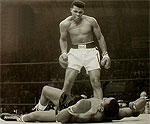 Muhammad Ali defeats Charles Liston in the World heavyweight title fight