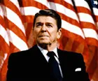American President Ronald Reagan reverses his earlier stance on South Africa and agrees to limited sanctions
