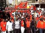 At a summit SA Trade Unions resolve to defy apartheid and labour laws