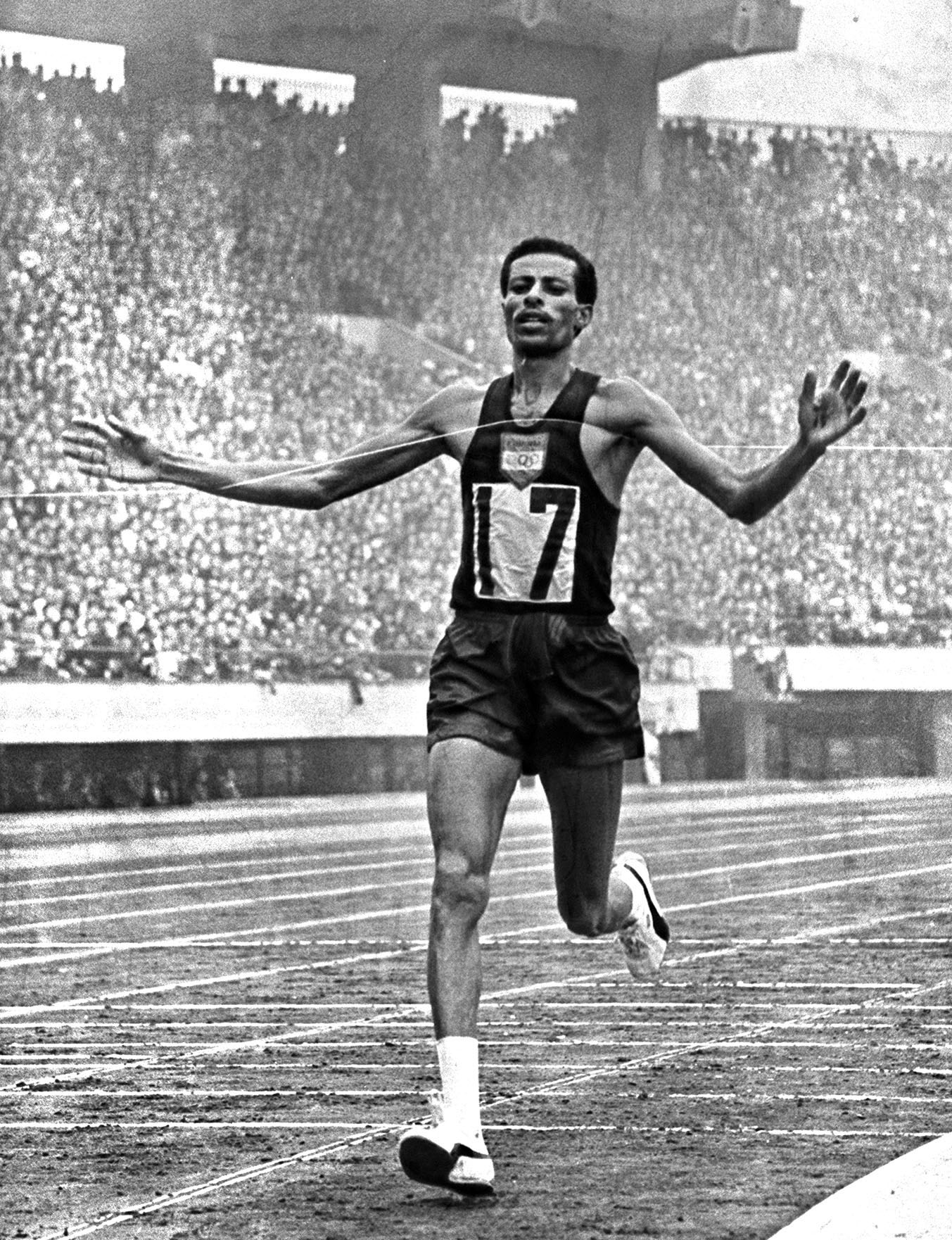 Abebe Bikila wins gold at Rome Olympic Games