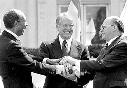 Camp David peace treaty is signed, ending 30 years of war between Egypt and Israel