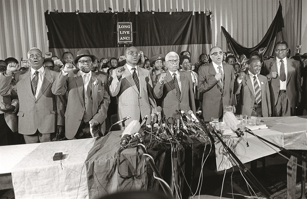 Walter Sisulu, Raymond Mhlaba and Ahmed Kathrada address the public after 26 years