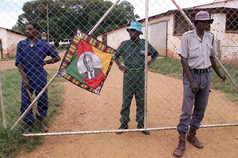 Hundreds of White-owned farms are seized by homeless people and pro-Mugabe war veterans in a violent campaign in Zimbabwe