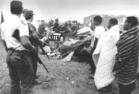 White sympathisers join evicted Black squatters in a protest 