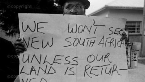 Protestors demanding the institution of a land claims court to hear claims for restitution, 1993