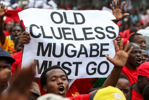 Opposition youth members protest against Robert Mugabe