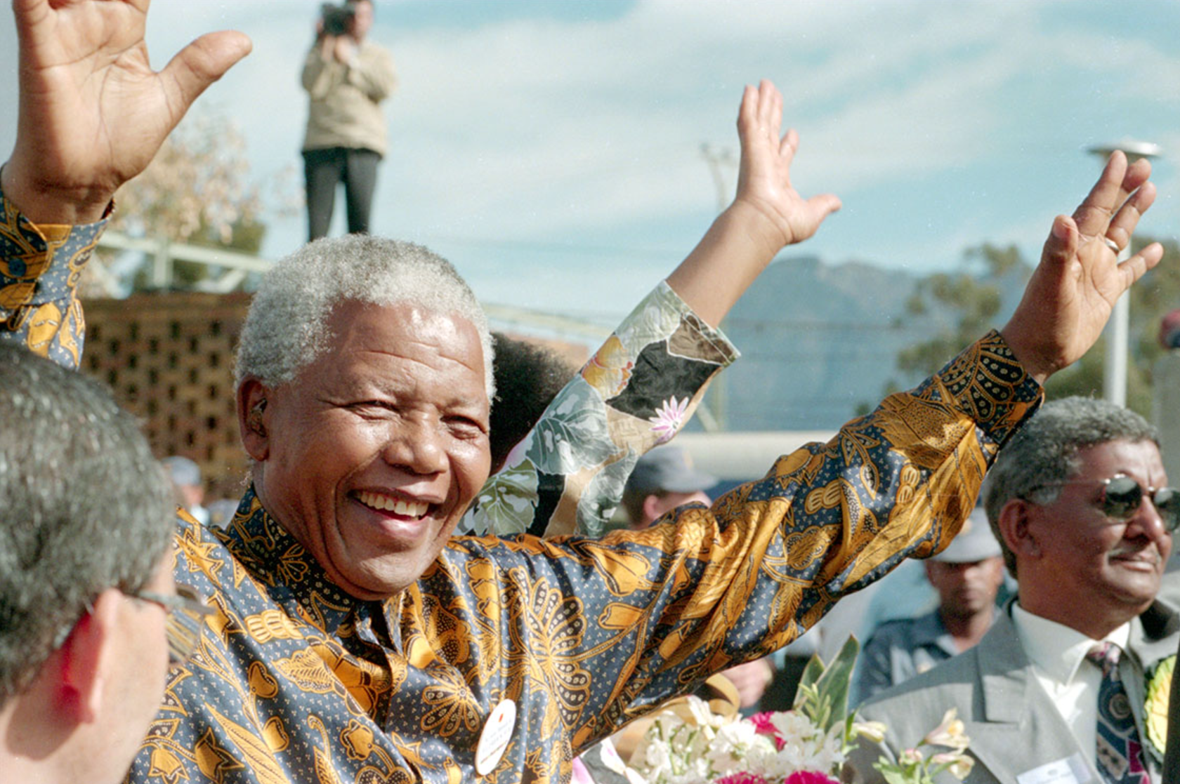 Nobel Laureate and former President of South Africa from 1994 to 1999 Nelson Mandela waves at his audience.Creator: Benny Gool  |  Credit: Benny Gool / Iconic Images Copyright: Â© Benny Gool