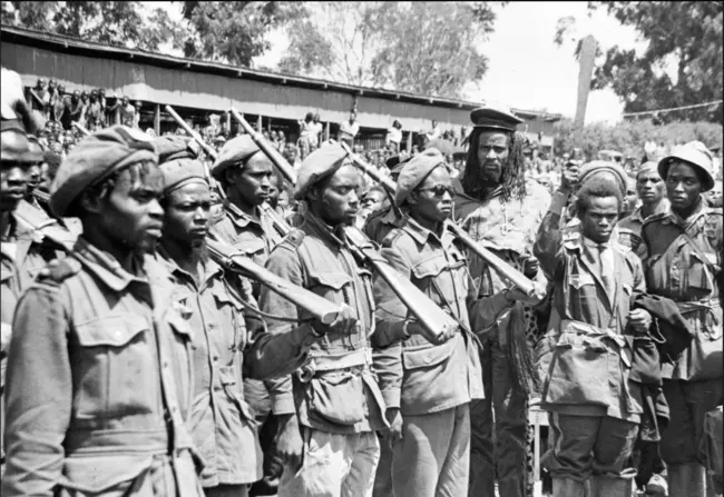 Over 400 Kikuyu suspected to be part of the Mau Mau movement are arrested in Kenya