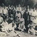 Dadoo School Cricket team at Zoo Lake, Johannesburg, with his Teacher, Mrs Griffiths in 1921