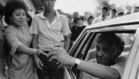 Prof. Gideon Mendal-Ismail Mohamed being escorted out of his home - 1985