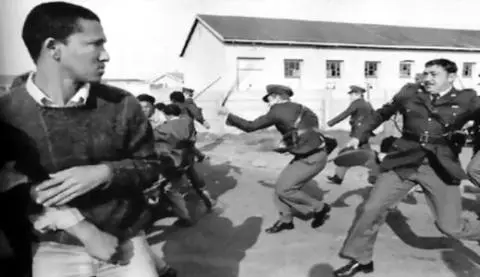 Police engage protesters during the march from Athlone Stadium to Polsmor Prison - Cape Town - July 1985