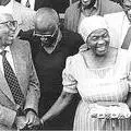 Walter Sisulu is released from prison, Albertina Sisulu is on his right and Archbishop Desmond Tutu, October 1989