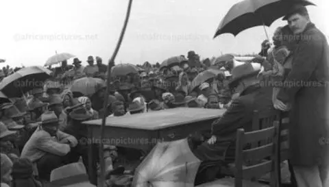 Pondo tribesmen listen to the officials report