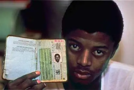 An African man shows his passbook