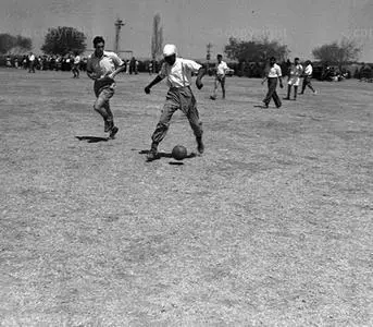 Oliver Tambo playing football