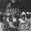 A youth flies an ANC flag from a statue of Jan Smuts during a march on Parliament. Cape Town, 2 February 1990
