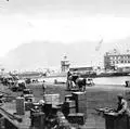 Cape Town docks with carts, ships. Martin Plaut collection