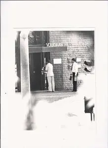 Drinks and food passed to trio and hostages. Silverton Siege, 1980.