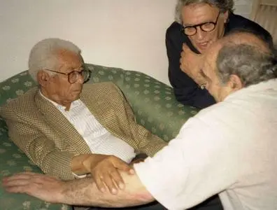 Walter Sisulu, Arthur Goldreich and Dennis Goldberg have a discussion