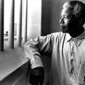 Nelson Mandela returns to his cell on Robben Island