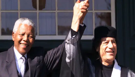 Nelson Mandela and Libyan Leader Muammar Qaddafi