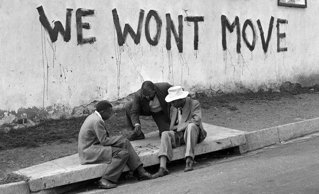 Pictured is a defiant slogan on a wall in Sophiatown in 1955