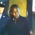 Solomon Mahlangu being escorted by policeman