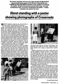 About standing with a poster showing photographs of Crossroads