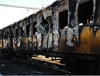 Commuters cause damage estimated at R30m when they set fire to several coaches and two offices at Germiston Station