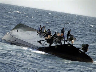 A ferry carrying 200 passengers capsizes near the coastal town of Robersport in Northwest Liberia