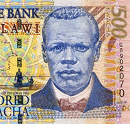 Malawi switches over to a new decimal currency, the Kwacha