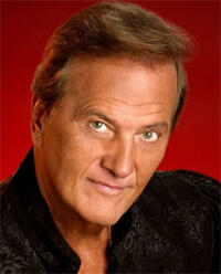 Pat Boone, American singer, actor and writer, begins a 10-day tour of South Africa 