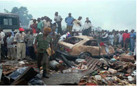 A cargo plane crashes into a market in Kinshasa, Zaire, killing at least 350 people