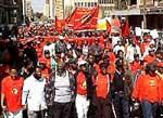 At a summit SA Trade Unions resolve to defy apartheid and labour laws