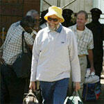 Three Zimbabwean intelligence officers stand trial for a bomb attack on an ANC house