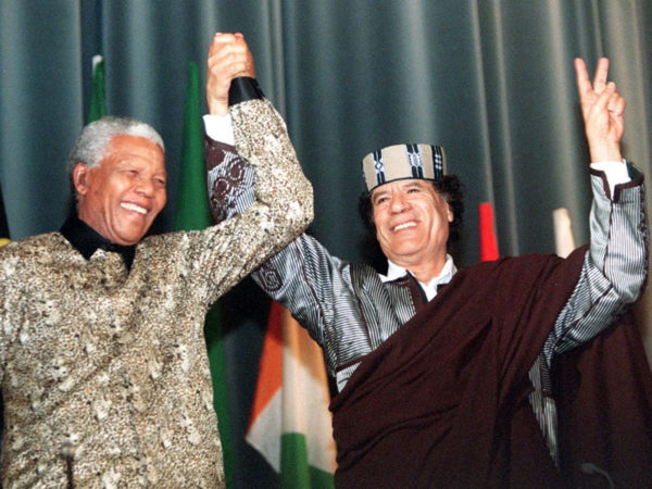 Nelson Mandela forged a close relationship with Libya's Muammar Gaddafi (AFP/Getty Images)