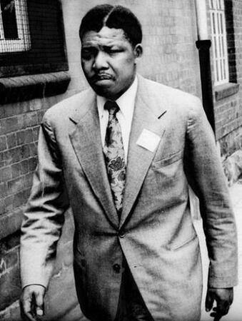 Nelson Mandela is acquitted of high treason