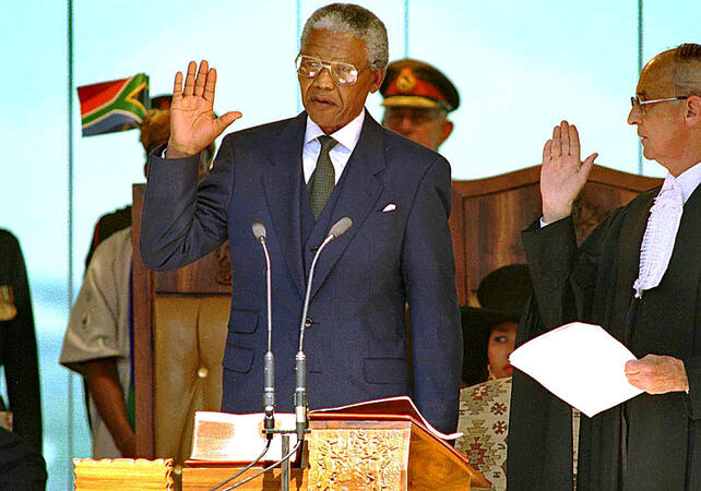 South African president Nelson Mandela is sworn in to office at the Union Buildings in Pretoria