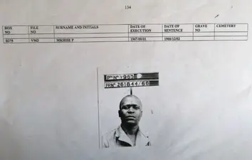 Pretoria Central Prison execution register entry and prison photograph of Petros Sipho Sibusiso Mkhize, recorded as "Mkhise P", File V963