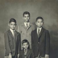 Dr Somalingum Leslie Ponnusamy - seated - with his brothers (L-R) Denny, Billy, Roy
