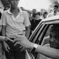 Prof. Gideon Mendal-Ismail Mohamed being escorted out of his home - 1985