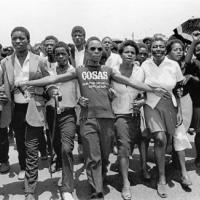 Students marching to a funeral of COSAS member