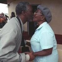 Thabo Mbeki greeting his mother with a kiss