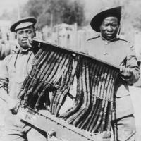 South African Native Labour Corps holding a shell-shattered radiator
